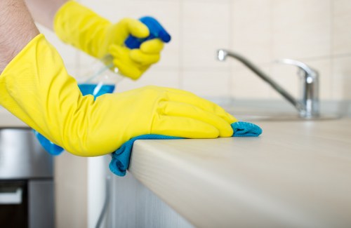 Local cleaning team vacuuming fine dust after building works in a Belsizepark property