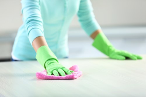 Professional carpet cleaning process in progress with protective care
